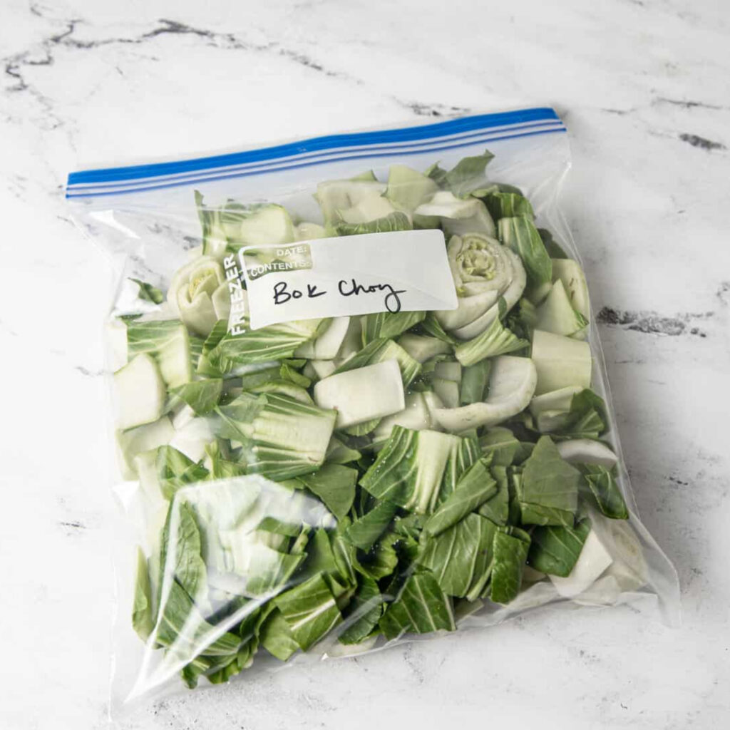 Image ok bok choy stored in a zip lock bag labeled bok choy