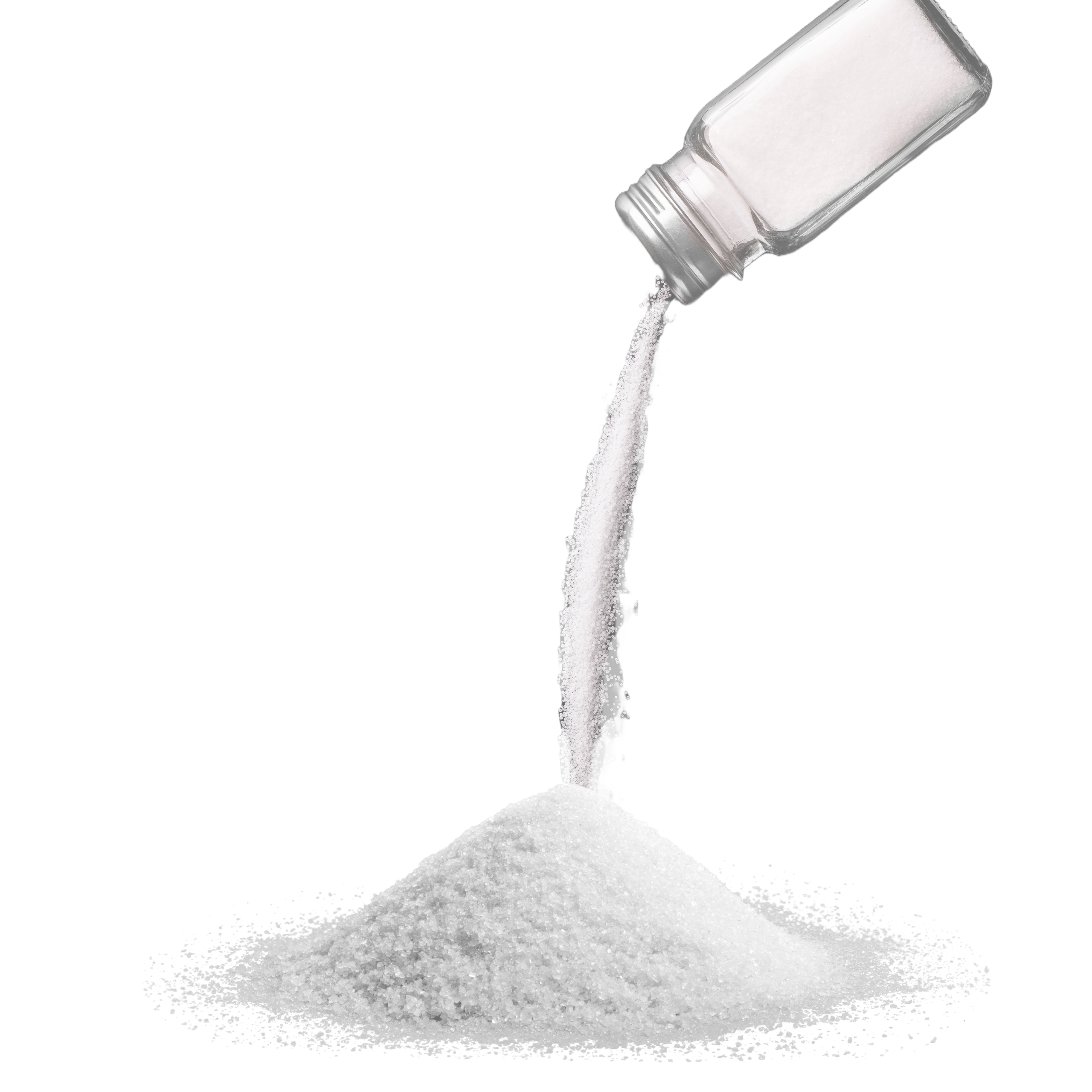 A clear glass salt shaker or small bottle tilted at an angle, pouring white salt onto a surface, forming a small mound or pile, against a white background.